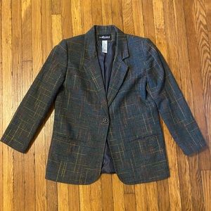 Dark gray vintage blazer with rainbow stitching.